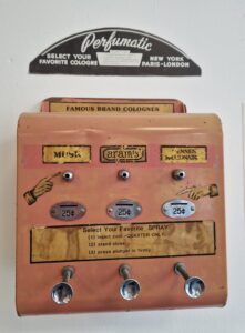 A large pink metal box with buttons.