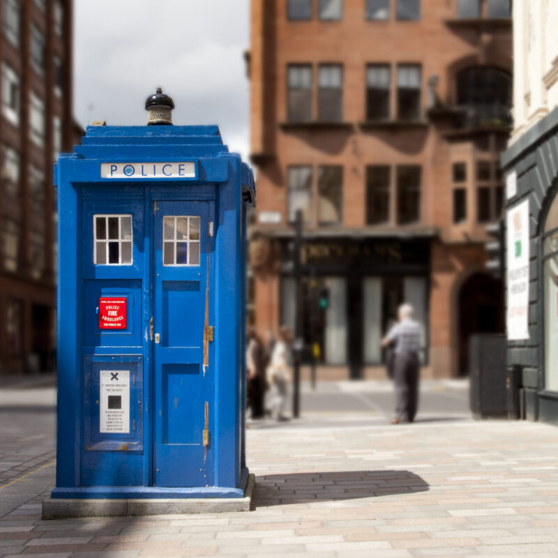 Blue Police Box on Glasgow City Centre street.